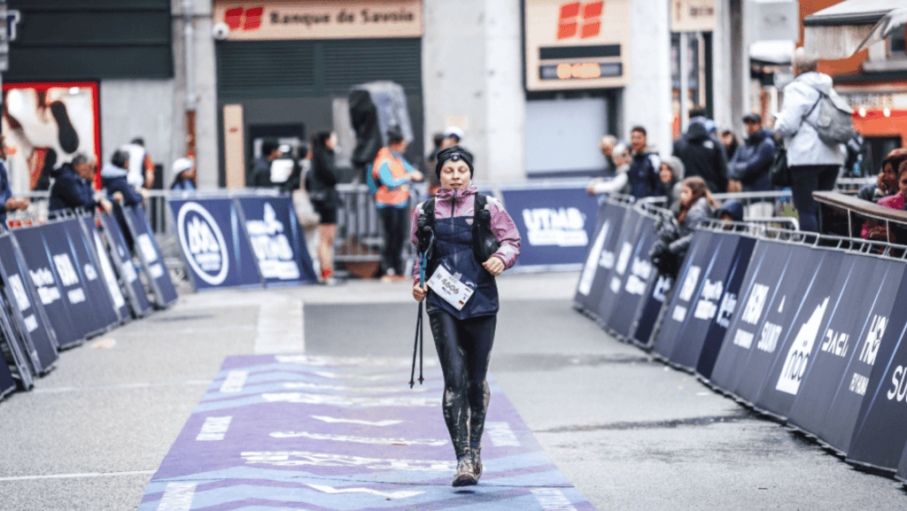 Woman runner on the finish line of CCC UTMB in Chamonix