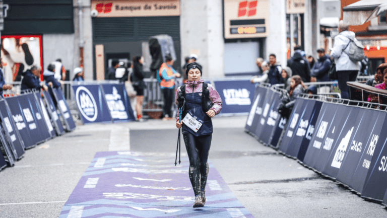 Woman runner on the finish line of CCC UTMB in Chamonix