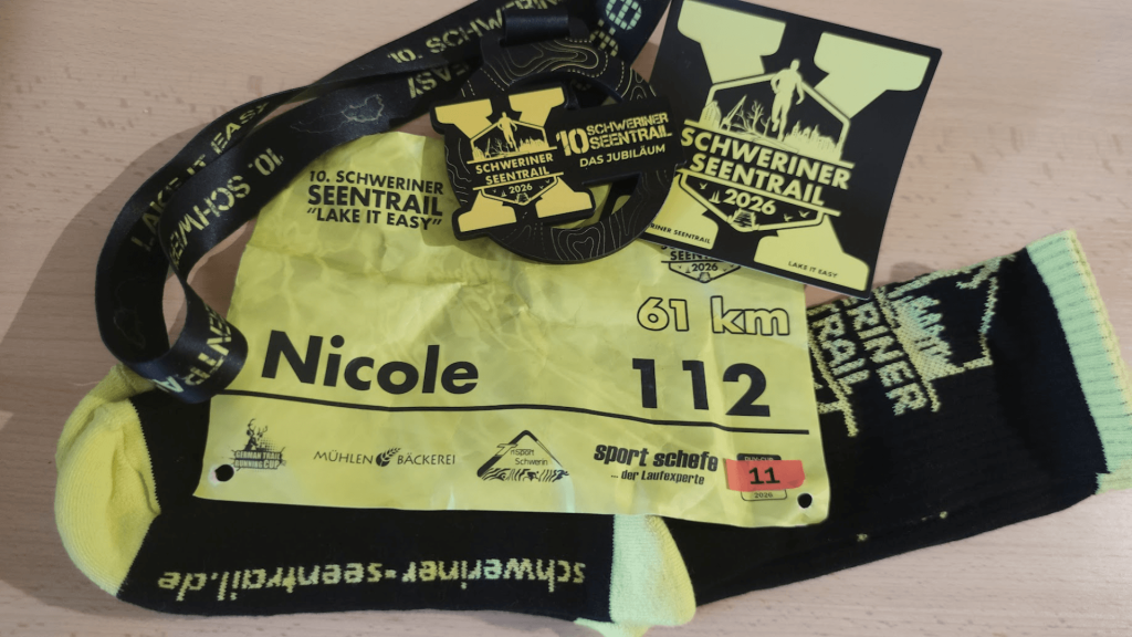 Schwerin Seen Trail race bib and medal